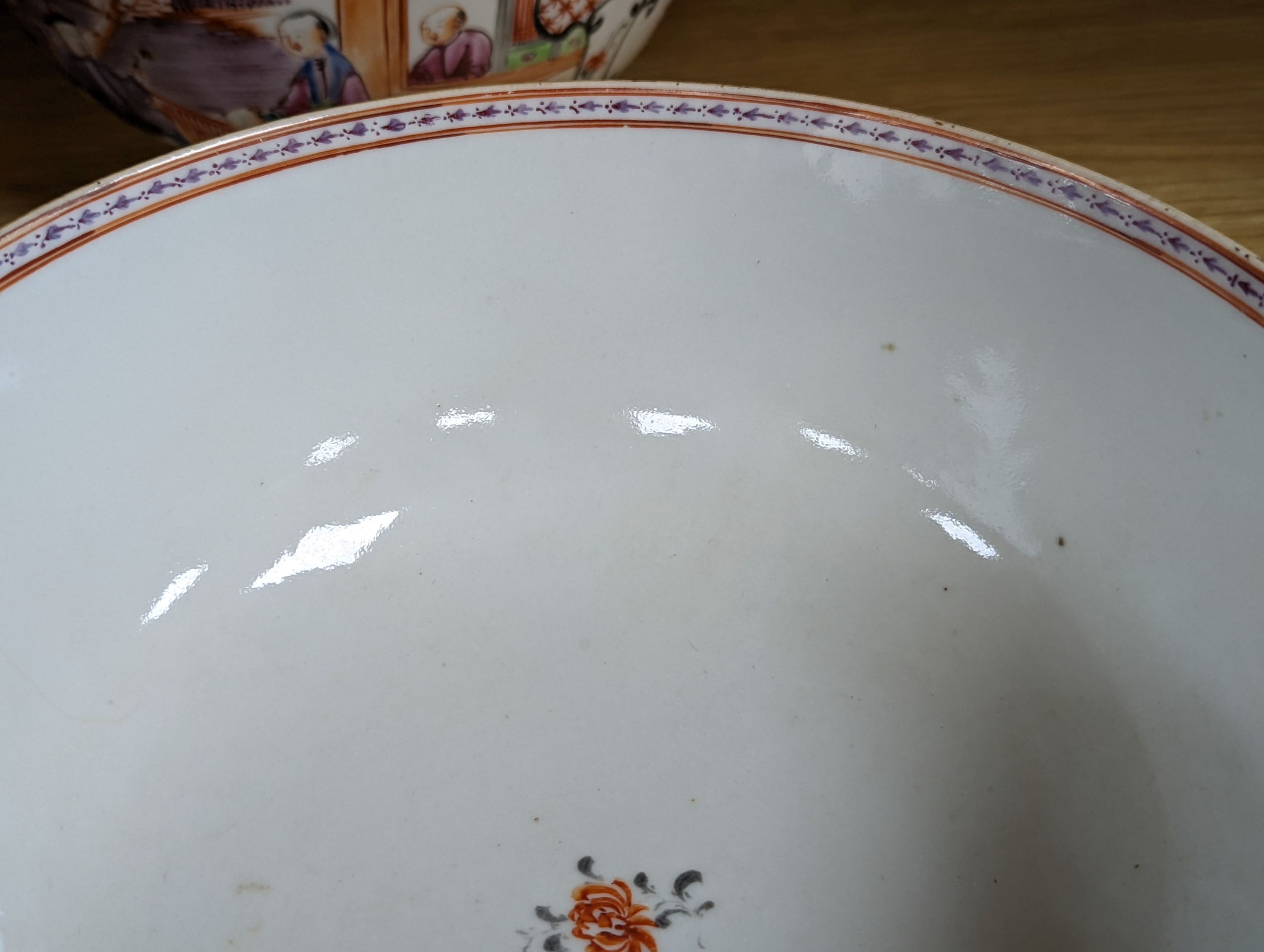 Two 18th century Chinese export bowls, a similar tea bowl and another Chinese blue and white tea bowl, largest 20cm diameter